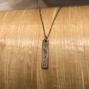 Recycled Sterling Silver Love necklace.